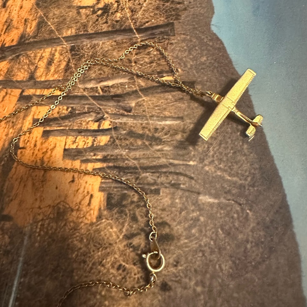 Unique Gold Toned Airplane Necklace